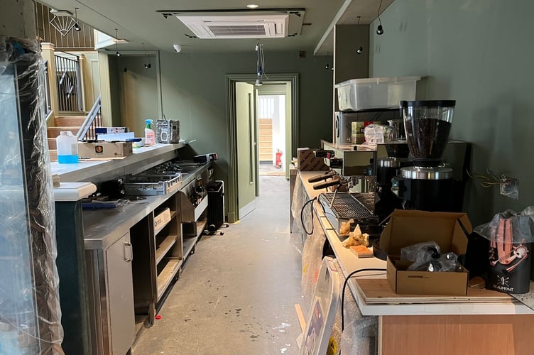 Behind the main reception area in the foyer, which leads into the main kitchen