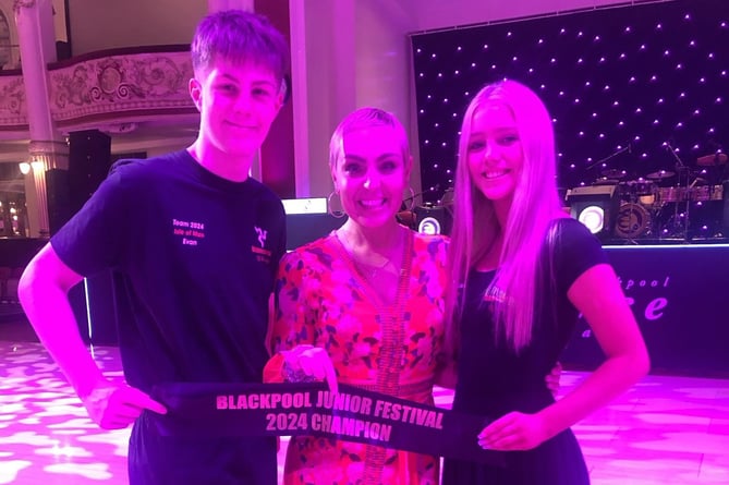 Onchan dance champions Evan O'Dea and Lula-Belle Findlay with Strictly Come Dancing star Amy Dowden (centre)