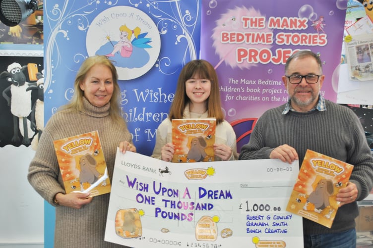 Lesley Turnbull, of Wish Upon a Dream (left) with Graiagh Smith and Rob Cowley with the £1,000 cheque