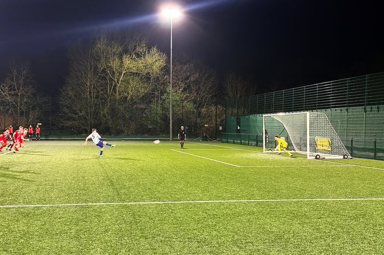 Jack McVey fires home from the penalty spot for FC Isle of Man against Colne on Friday night (Photo: Sam Turton)