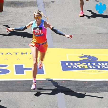 Christa Cain celebrates as she crosses the finish line in the Boston Marathon in a time of two hours 46 minutes 53 seconds. That is unofficially the fifth fastest marathon time by an Isle of Man woman to date