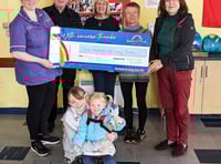 Cafe Lingo makes donation to Rebecca House