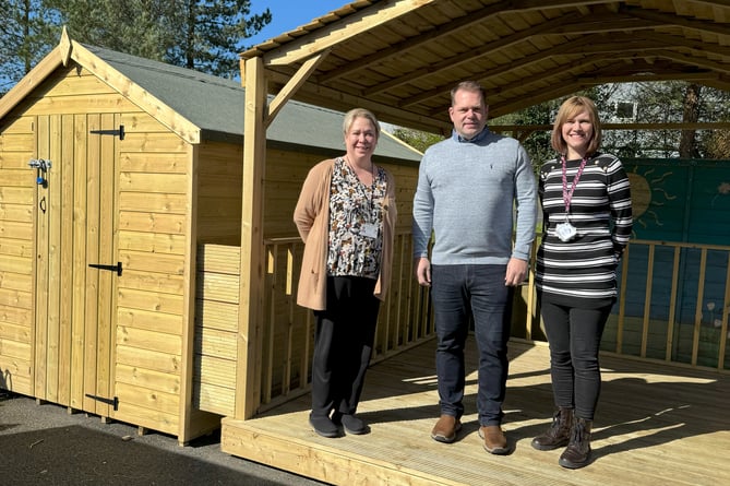 (Left to right) Riss Forrester, head teacher of Ballacottier School, Stuart Colligon (Founder and managing director of the Auxesia Group) and Cathy Holland, Rainbow Room manager in the new outdoor area
