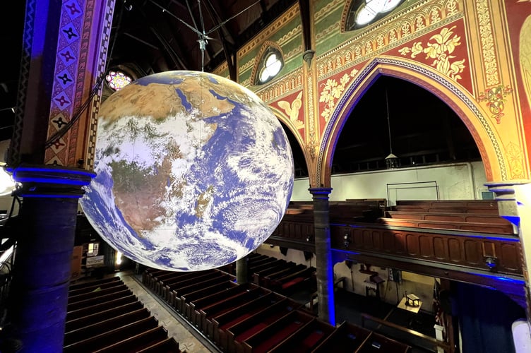 Gaia, an illuminated globe installation by UK artist Luke Jerram, at St Thomas' Church in Douglas