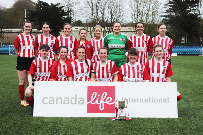 Peel players celebrate with the Canada Life Women's FA Cup after beating Onchan in Sunday's final at the Bowl (Photo: Paul Hatton)