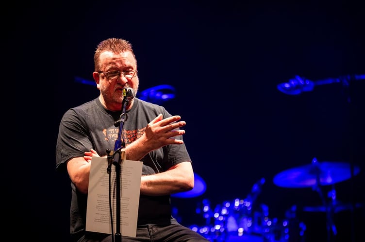 Music promoter Lenny Conroy speaks at the final gig he has organised with Davey Knowles at the Gaiety Theatre