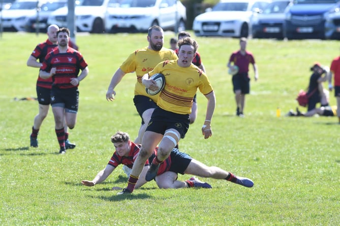 Manx Cup rugby: Douglas (in yellow) v Ramsey (in red)