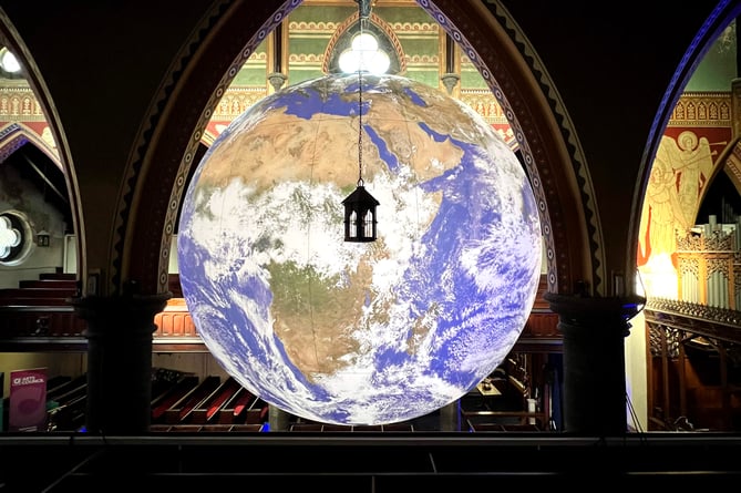 Gaia, an illuminated globe installation by UK artist Luke Jerram, at St Thomas's Church in Douglas