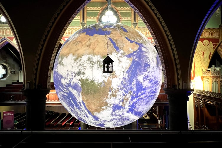 Gaia, an illuminated globe installation by UK artist Luke Jerram, at St Thomas's Church in Douglas