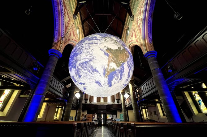 Gaia, an illuminated globe installation by UK artist Luke Jerram, at St Thomas's Church in Douglas