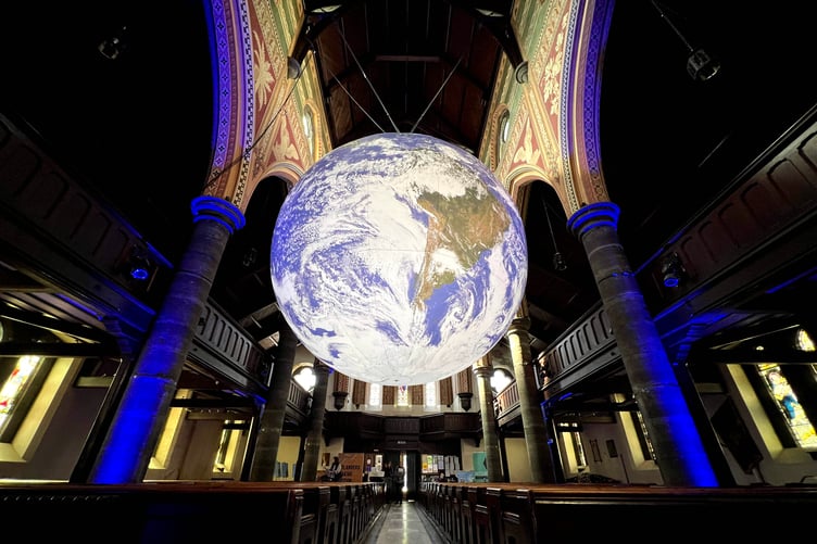 Gaia, an illuminated globe installation by UK artist Luke Jerram, at St Thomas's Church in Douglas