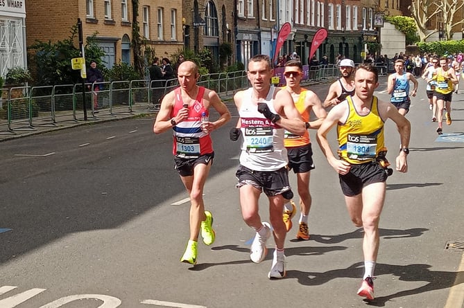 Paul Atherton (centre) in action at the London Marathon