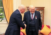 Leader of world famous Purple Helmets presented with British Empire Medal