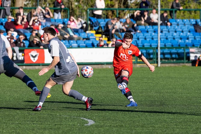 Ste Whitley fires goalwards for FC Isle of Man against AFC Liverpool at the Bowl on Saturday evening (Photo: Gary Weightman)