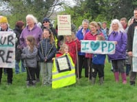 Protesters march against Poyll Dooey housing