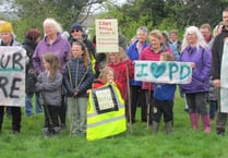 Protesters march against Poyll Dooey housing