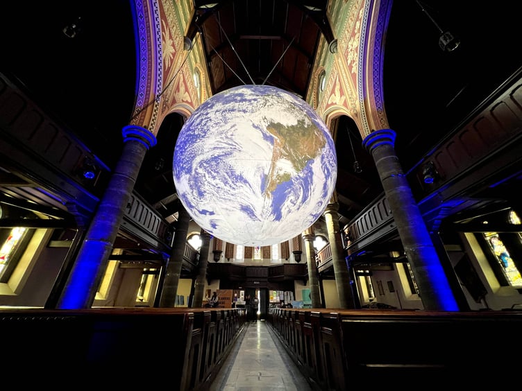 Gaia, an illuminated globe installation by UK artist Luke Jerram, at St Thomas' Church in Douglas