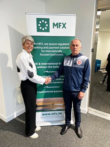 England walking footballer Steve Falconer pictured with MFX managing director May Hooper after receiving sponsorship from the company