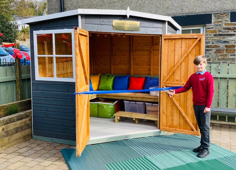 David Cowley's grandson, Alex, played a pivotal role in commemorating the occasion, cutting the ribbon and officially unveiling the new reading shed
