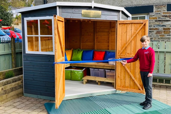 David Cowley's grandson, Alex, played a pivotal role in commemorating the occasion, cutting the ribbon and officially unveiling the new reading shed
