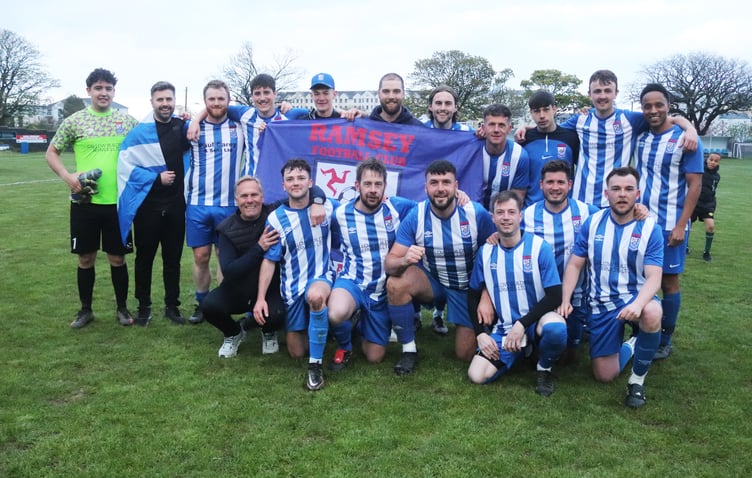 Ramsey players celebrating after clinching the Canada Life Combination One league title with a 3-2 victory over northern rivals Ayre Utd on Wednesday evening (Photo: Paul Hatton)