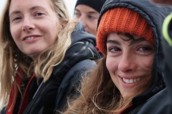 Rowan Henthorn (right) with her crewmates