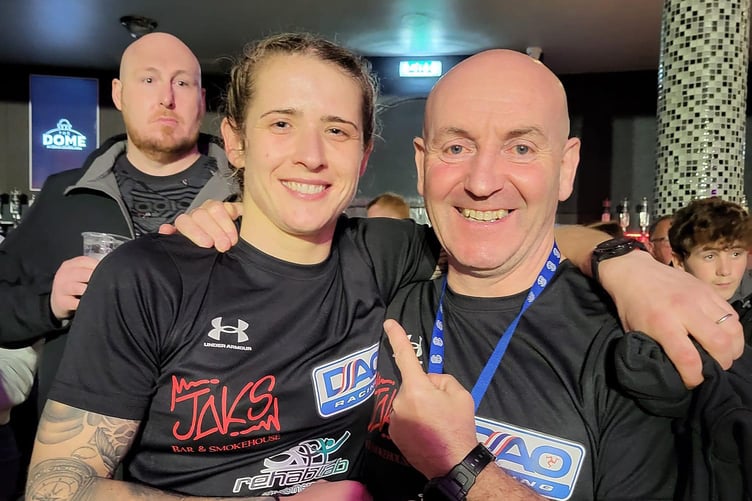 Jade 'The Grenade' Burden with her Manx ABC coach Peter Roberts Jr after her winning debut