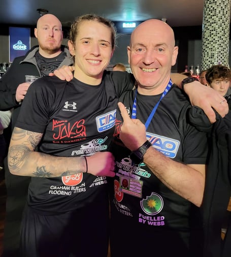 Jade 'The Grenade' Burden with her Manx ABC coach Peter Roberts Jr after her winning debut
