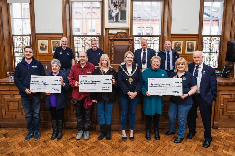 Councillor Mrs Natalie Byron-Teare JP with representatives from local charities
