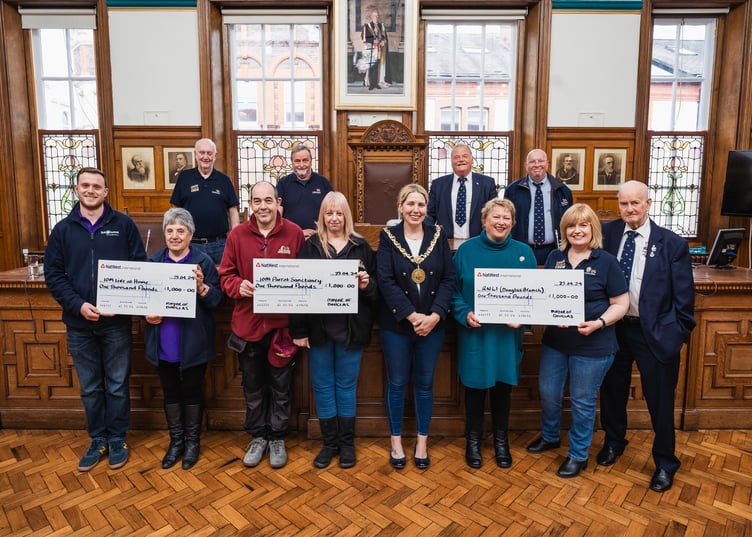 Councillor Mrs Natalie Byron-Teare JP with representatives from local charities