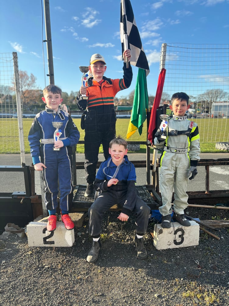 The ninja kart podium featuring (standing left to right) Mason Ross, Dylan Westbrook and Carter Ffrench. (Sitting) Roman Hooper.