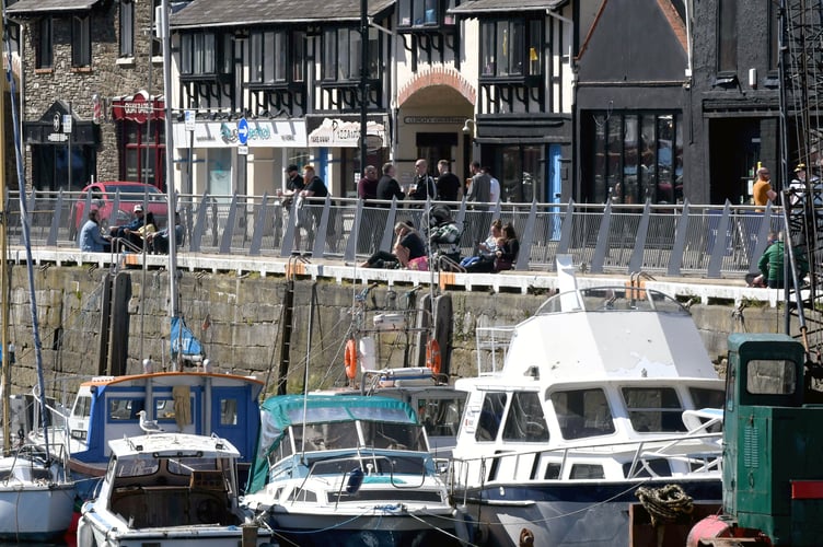 Crowds enjoying a drink on North Quay in Douglas 