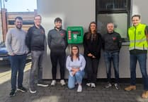 Charity places new defibrillator in island's capital