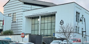 Dealer found with wraps of cocaine in his coat weeps as he's jailed