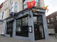 Woman bit police officer and kicked bouncer outside pub