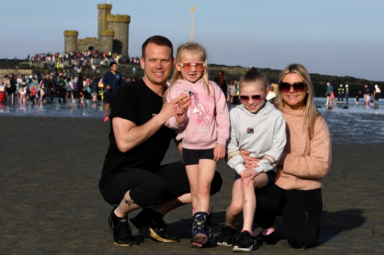 A guided walk to the Tower of Refuge - pictured is the Kitching family