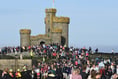 Pictures show crowds taking part in Tower of Refuge Walk 2024