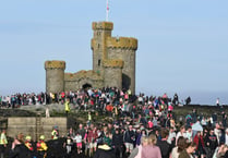 Pictures show crowds taking part in Tower of Refuge Walk 2024