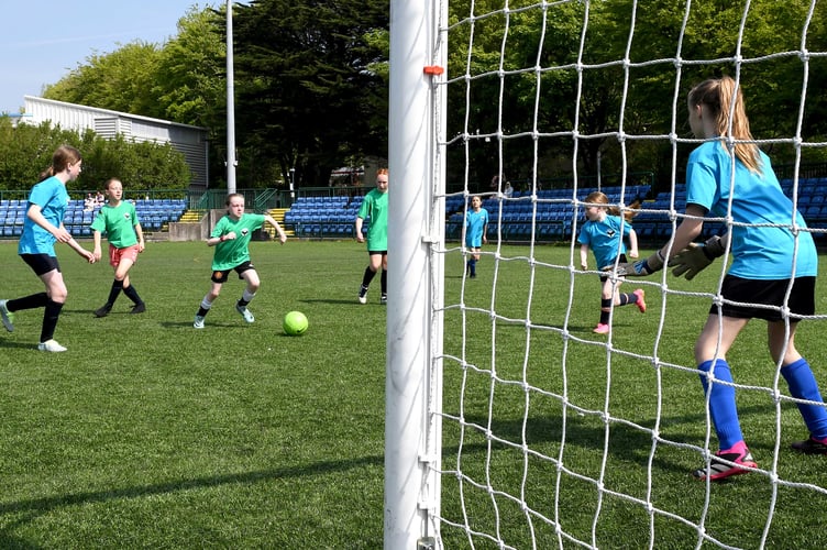 Youngsters taking part in girls' football at the Manx Youth Games