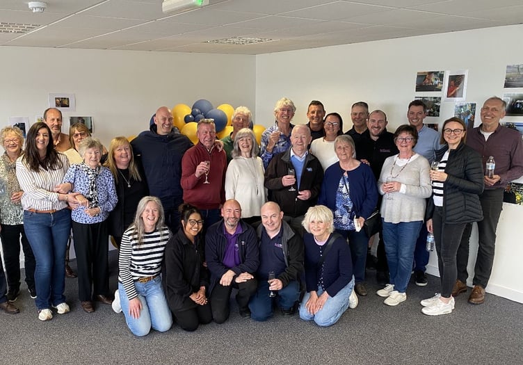 Noel O’Reilly (centre, red top) with family, friends and colleagues