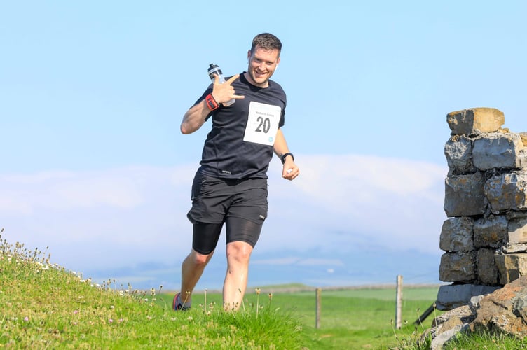 Runner remains in good spirits as he heads through Scarlett