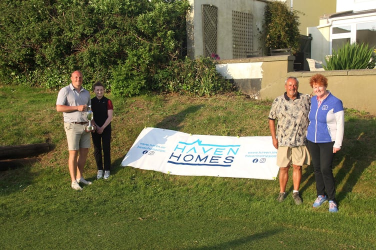 (Left to right)  Isle of Man Stroke Play Championship overall winners James Arneil and Emma Noon alongside nett winners Keith Ward and Di Neale
