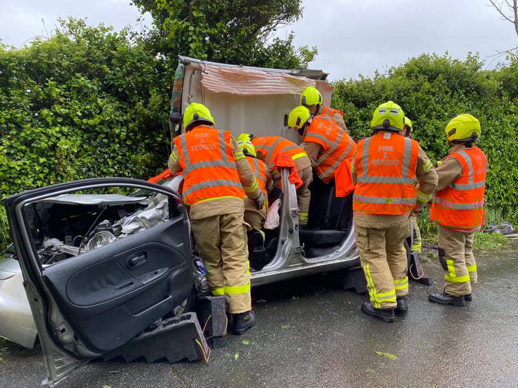Fire crews had to cut someone from a car in Ballasalla earlier today