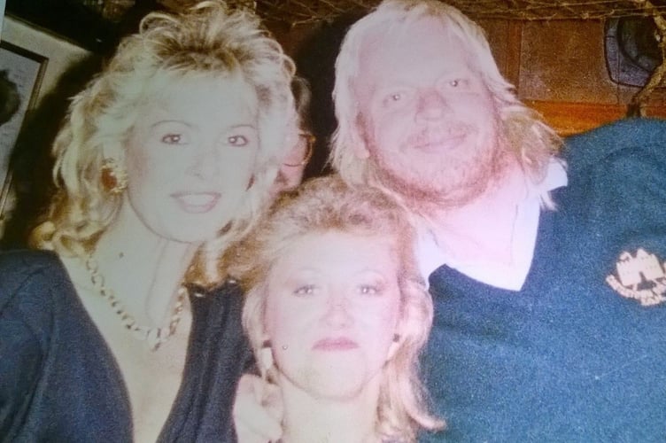 Linda Caulfield with Rick and Nina Wakeman