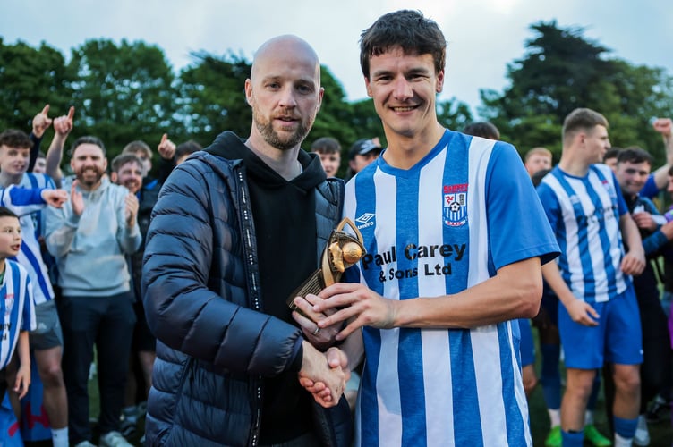 Ramsey defender Graham Kennish receives the man of the match award from Karl Gartland (Photo: Gary Weightman)