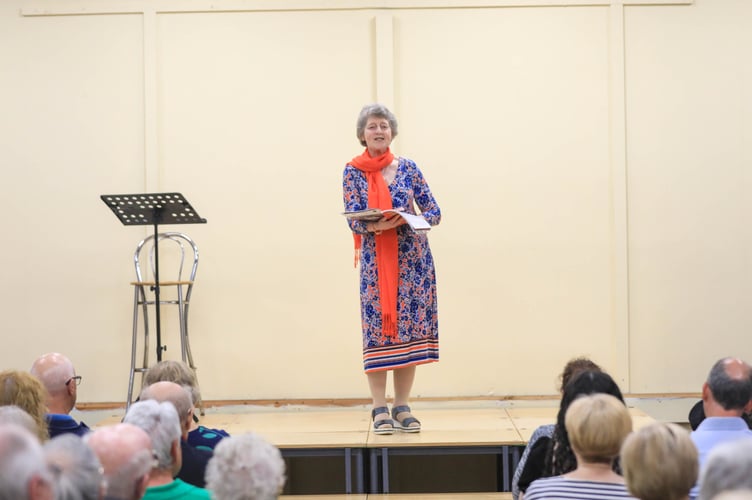 Judith Ley comperes the Post Guild Concert held at St John's Methodist Church Hall.