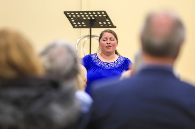 Kay Harker sings the song Why Can't He Be You by Patsy Cline.