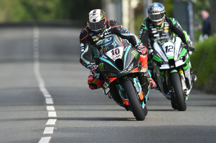 Peter Hickman leads David Johnson into Kirk Michael during Tuesday evening's qualifying session 