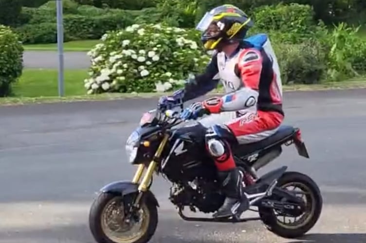 Sam West on the bike he borrowed from a spectator to get back to the paddock