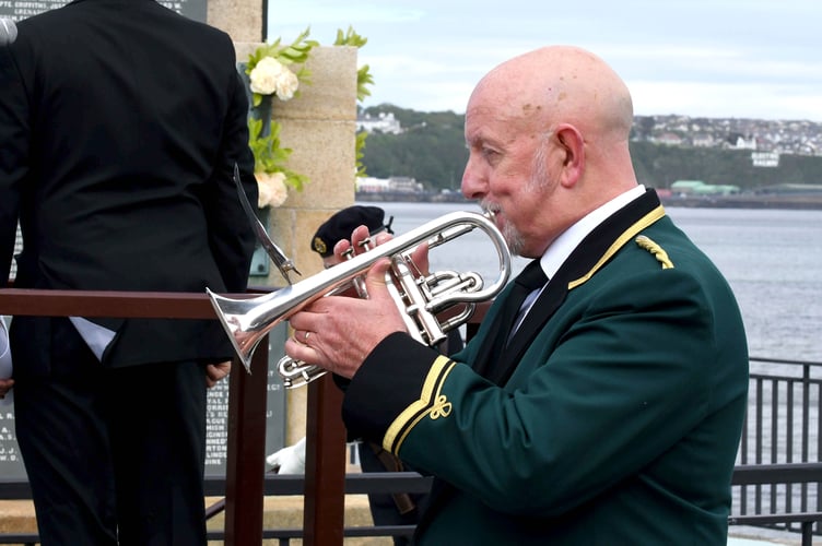A service to mark the centenary of the Douglas War Memorial on Harris Promenade - bugler Ken Mitchell of Douglas Town Band
